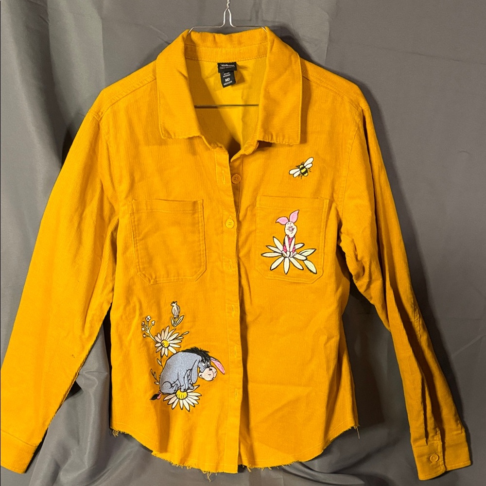 Disney’s Winnie the Pooh Golden Shirt with Distressed edges. Like new